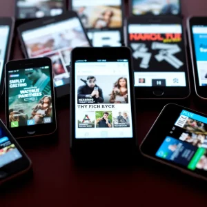 Mobile devices displaying diverse marketing content across various screens.